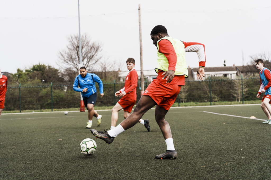 Erasmuns Adjei playing football at IADT